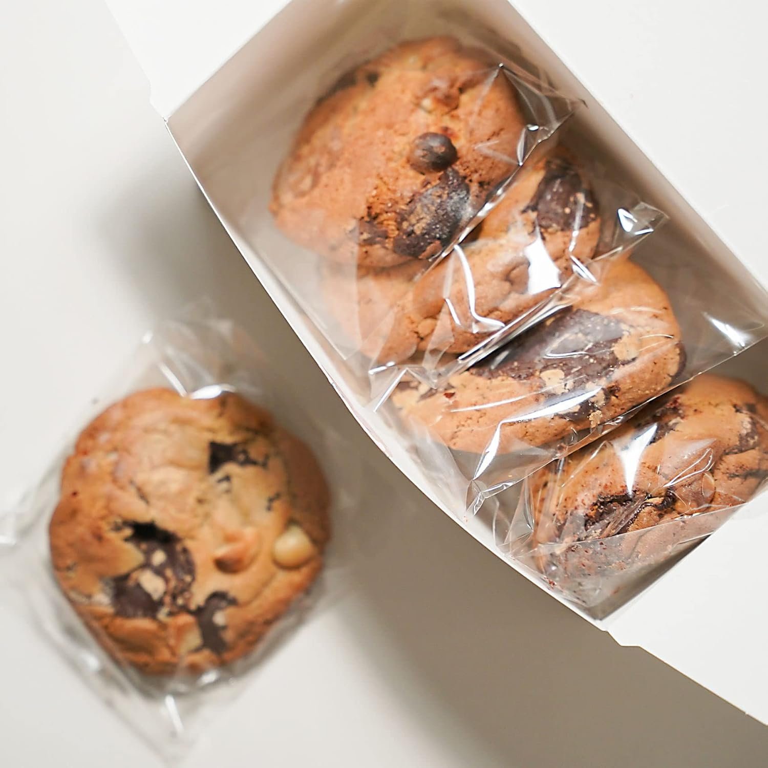 Großhandel 200 Stück klare, selbstverschließende Cellophanbeutel für Cookies, individuell mit Ihrem Logo, Hersteller für maßgeschneiderte Verpackungen, 5x5 Zoll, wiederverwendbar.