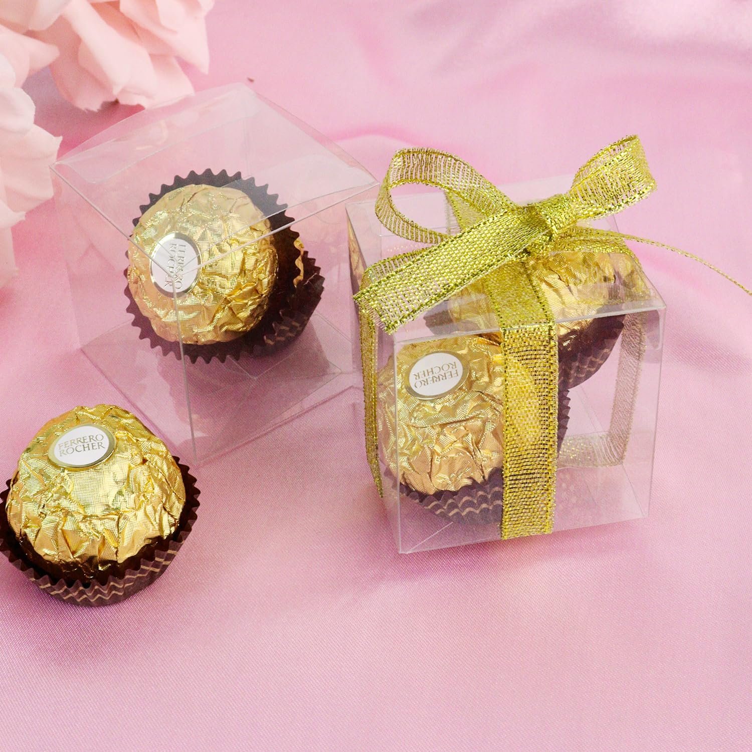 Großhandel 50er Pack klare Süßigkeitenboxen, 2x2x2 Zoll transparente Kunststoffgeschenkboxen mit Band, Favoritenboxen für Leckereien, individuelles Logo, Hersteller für Bulk-Bestellungen. Großhandel 50er Pack klare Süßigkeitenboxen, 2x2x2 Zoll transparente Kunststoffgeschenkboxen mit Band, Favoritenboxen für Leckereien, individuelles Logo, Hersteller für Bulk-Bestellungen.