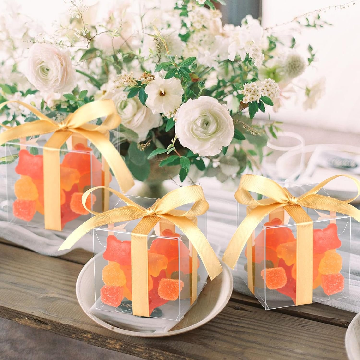 Großhandel 50 Stück klare Geschenkboxen 2x2x2 Zoll mit goldenen Bändern, individuelle Logos, Hersteller von Macrame-Boxen für Hochzeitsfeiern, Babypartys, Weihnachten. OEM Geschenkboxen in Großmenge verfügbar. Großhandel 50 Stück klare Geschenkboxen 2x2x2 Zoll mit goldenen Bändern, individuelle Logos, Hersteller von Macrame-Boxen für Hochzeitsfeiern, Babypartys, Weihnachten. OEM Geschenkboxen in Großmenge verfügbar.