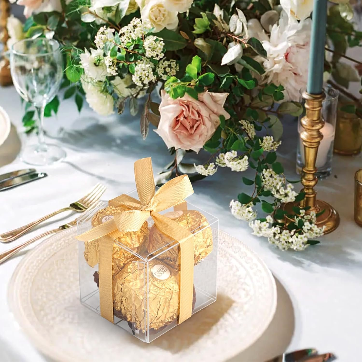 Großhandel 50 Stück klare Geschenkboxen 2x2x2 Zoll mit goldenen Bändern, individuelle Logos, Hersteller von Macrame-Boxen für Hochzeitsfeiern, Babypartys, Weihnachten. OEM Geschenkboxen in Großmenge verfügbar. Großhandel 50 Stück klare Geschenkboxen 2x2x2 Zoll mit goldenen Bändern, individuelle Logos, Hersteller von Macrame-Boxen für Hochzeitsfeiern, Babypartys, Weihnachten. OEM Geschenkboxen in Großmenge verfügbar.