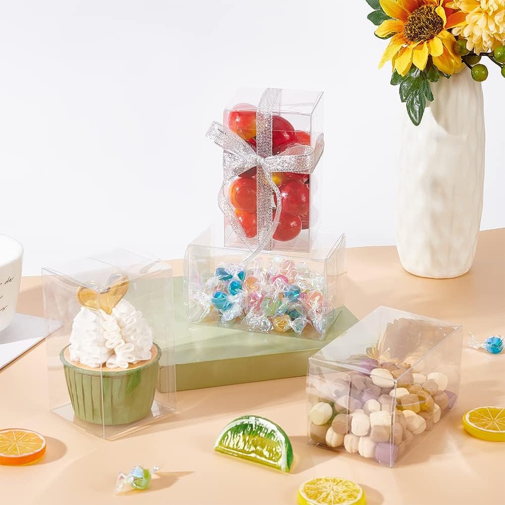 Großhandel 30 Stück 2.3x2.3x4 transparente Kunststoff Party Favor Box für Hochzeitsdekoration, Schokolade, Süßigkeiten, Kekse, Geschenke zum Muttertag, individuell bedruckte Verpackung, Hersteller für maßgeschneiderte Lösungen. Großhandel 30 Stück 2.3x2.3x4 transparente Kunststoff Party Favor Box für Hochzeitsdekoration, Schokolade, Süßigkeiten, Kekse, Geschenke zum Muttertag, individuell bedruckte Verpackung, Hersteller für maßgeschneiderte Lösungen.