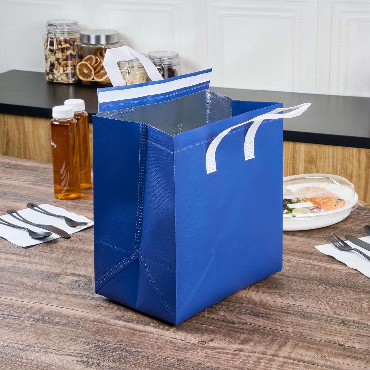 Großhandel Isolierte Liefertaschen 25 Stück 26 x 17 x 28 cm OEM Vliesstoff blau mit stabilen Griffen manipulationssicher faltbar Lieferant
